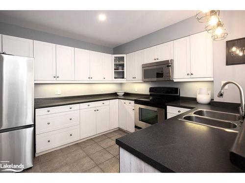 19 River Run, Collingwood, ON - Indoor Photo Showing Kitchen With Double Sink