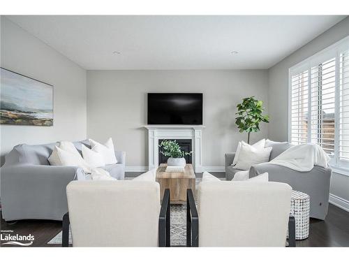 56 Lockerbie Crescent, Collingwood, ON - Indoor Photo Showing Living Room With Fireplace