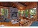 70 Caisses Island, Bracebridge, ON  - Indoor Photo Showing Living Room With Fireplace 