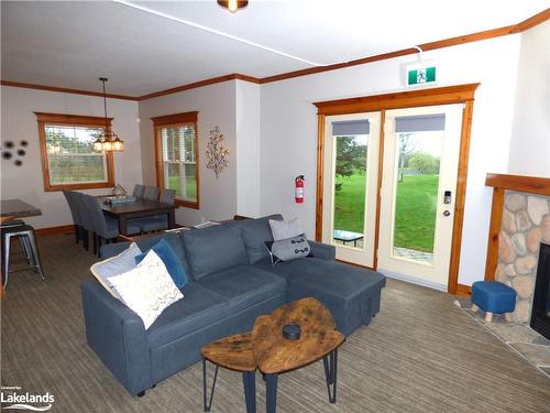 110-184 Snowbridge Way, The Blue Mountains, ON - Indoor Photo Showing Living Room With Fireplace