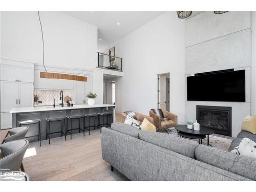 107 Tekiah Road, Clarksburg, ON - Indoor Photo Showing Living Room With Fireplace