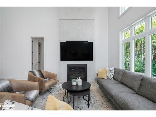 107 Tekiah Road, Clarksburg, ON - Indoor Photo Showing Living Room With Fireplace