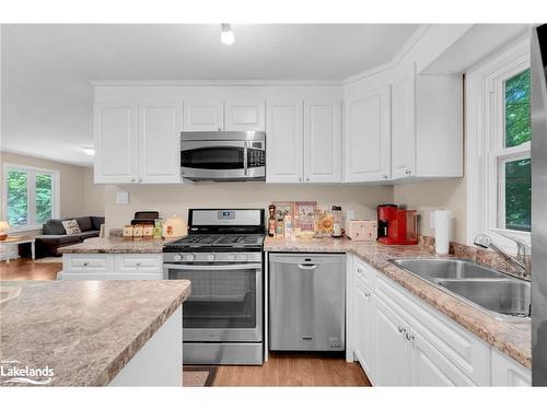 34 Coutnac Crescent, Tiny, ON - Indoor Photo Showing Kitchen With Double Sink