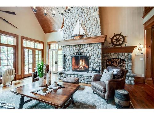 1902 Foxpoint Road, Dwight, ON - Indoor Photo Showing Living Room With Fireplace