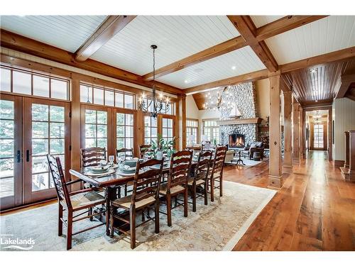 1902 Foxpoint Road, Dwight, ON - Indoor Photo Showing Dining Room With Fireplace