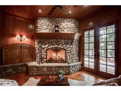 1902 Foxpoint Road, Dwight, ON - Indoor Photo Showing Living Room With Fireplace