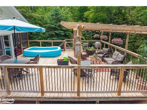 256 Woodland Drive, Huntsville, ON - Outdoor With Above Ground Pool With Deck Patio Veranda With Exterior