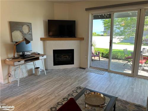 670 Johnston Park Avenue, Collingwood, ON - Indoor Photo Showing Living Room With Fireplace