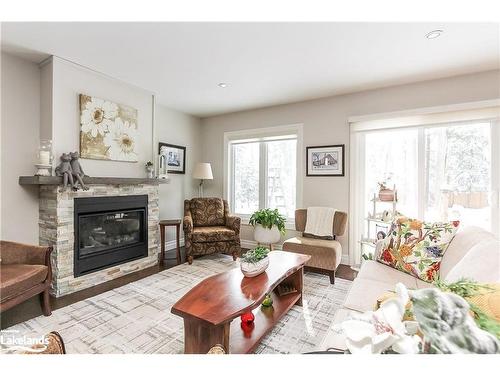 52 29Th Street N, Wasaga Beach, ON - Indoor Photo Showing Living Room With Fireplace