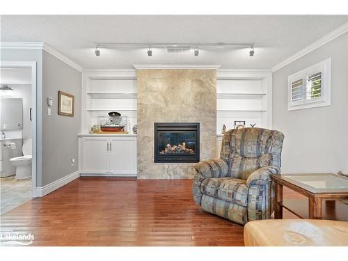 18 Royal Beech Drive, Wasaga Beach, ON - Indoor Photo Showing Living Room With Fireplace