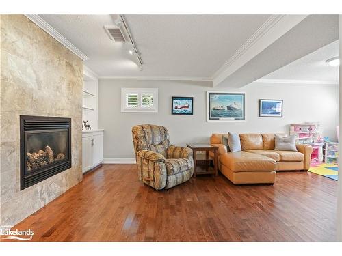 18 Royal Beech Drive, Wasaga Beach, ON - Indoor Photo Showing Living Room With Fireplace