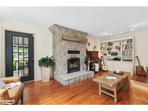 54 Logging Trail, Huntsville, ON - Indoor Photo Showing Living Room With Fireplace
