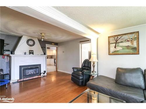 55 River Ave Crescent, Wasaga Beach, ON - Indoor Photo Showing Living Room With Fireplace