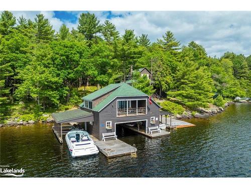 29 Is Keewaydin Island, Muskoka Lakes, ON - Outdoor With Body Of Water With Deck Patio Veranda