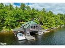 29 Is Keewaydin Island, Muskoka Lakes, ON  - Outdoor With Body Of Water With Deck Patio Veranda 