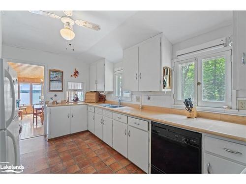 29 Is Keewaydin Island, Muskoka Lakes, ON - Indoor Photo Showing Kitchen With Double Sink