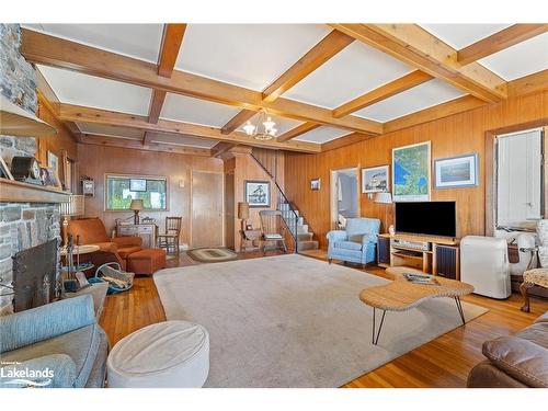 29 Is Keewaydin Island, Muskoka Lakes, ON - Indoor Photo Showing Living Room With Fireplace