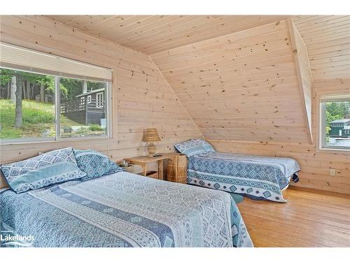 29 Is Keewaydin Island, Muskoka Lakes, ON - Indoor Photo Showing Bedroom