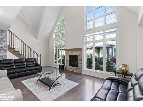 4 Country Trail, Port Severn, ON - Indoor Photo Showing Living Room With Fireplace