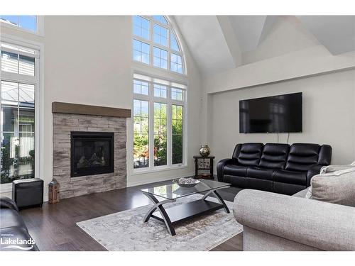 4 Country Trail, Port Severn, ON - Indoor Photo Showing Living Room With Fireplace