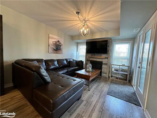 107-5 Anchorage Crescent, Collingwood, ON - Indoor Photo Showing Living Room With Fireplace