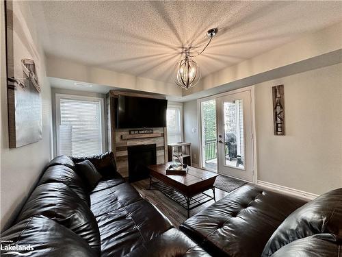 107-5 Anchorage Crescent, Collingwood, ON - Indoor Photo Showing Living Room With Fireplace