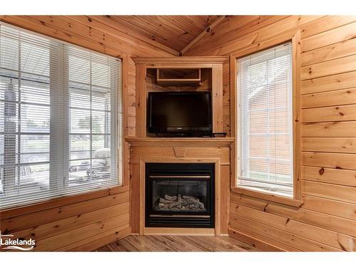 19 Cabin Crescent, Wasaga Beach, ON - Indoor Photo Showing Living Room With Fireplace