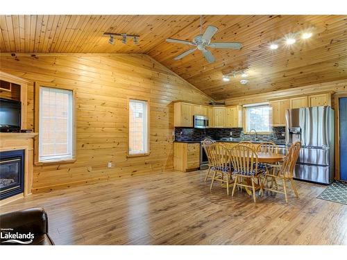 19 Cabin Crescent, Wasaga Beach, ON - Indoor Photo Showing Dining Room With Fireplace