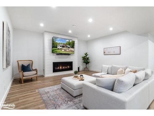 6 Boulder Court, Huntsville, ON - Indoor Photo Showing Living Room With Fireplace