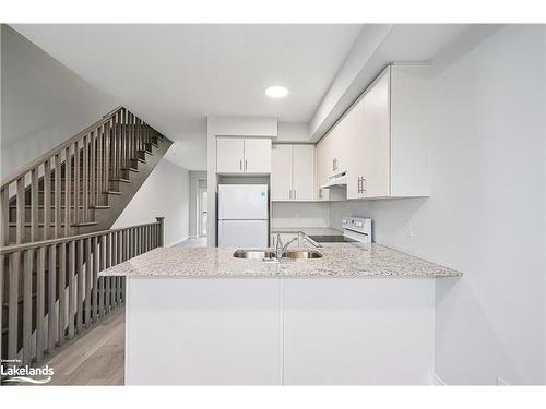 2-35 Dawson Drive, Collingwood, ON - Indoor Photo Showing Kitchen With Double Sink