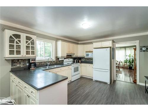 66 Joliet Crescent, Tiny, ON - Indoor Photo Showing Kitchen With Double Sink