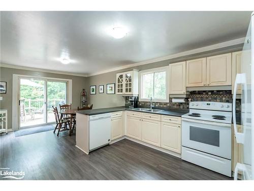 66 Joliet Crescent, Tiny, ON - Indoor Photo Showing Kitchen With Double Sink