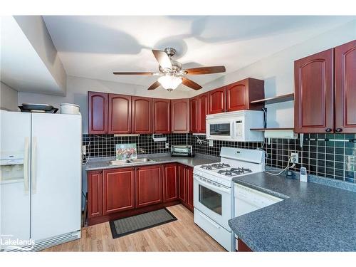 66 Joliet Crescent, Tiny, ON - Indoor Photo Showing Kitchen With Double Sink