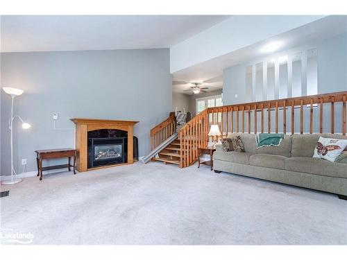 66 Joliet Crescent, Tiny, ON - Indoor Photo Showing Living Room With Fireplace