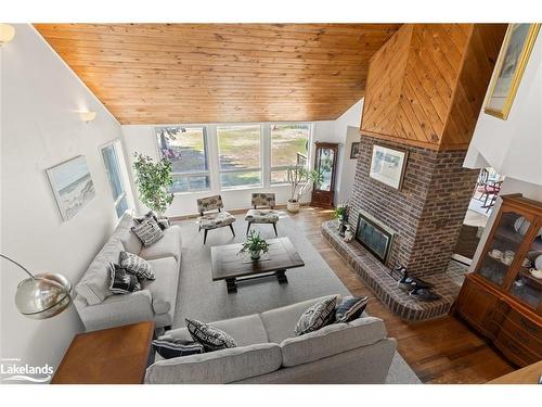 57 Bernard Crescent, Sundridge, ON - Indoor Photo Showing Living Room With Fireplace