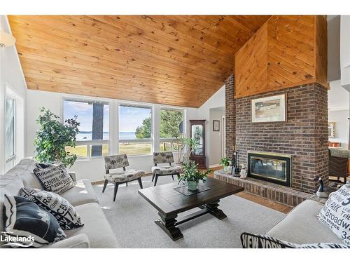 57 Bernard Crescent, Sundridge, ON - Indoor Photo Showing Living Room With Fireplace