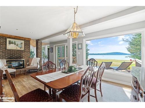 57 Bernard Crescent, Sundridge, ON - Indoor Photo Showing Dining Room With Fireplace