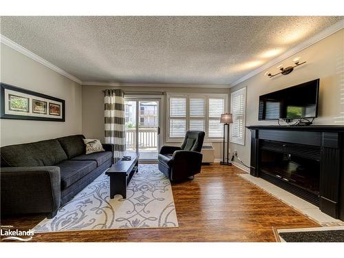 705-796468 Grey Road 19, The Blue Mountains, ON - Indoor Photo Showing Living Room With Fireplace