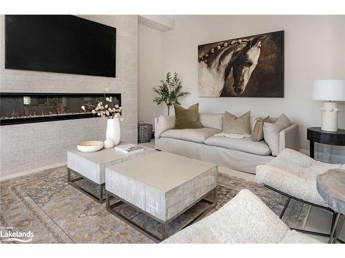 53 Tracey Lane, Collingwood, ON - Indoor Photo Showing Living Room With Fireplace