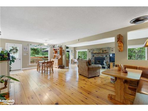 1198 Rodeo Road, Sundridge, ON - Indoor Photo Showing Living Room With Fireplace