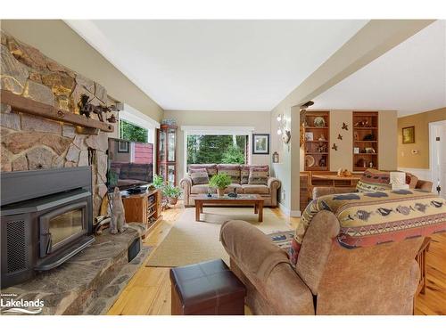 1198 Rodeo Road, Sundridge, ON - Indoor Photo Showing Living Room With Fireplace