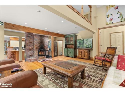 928 Jones Lane, Huntsville, ON - Indoor Photo Showing Living Room With Fireplace