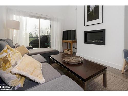 205-13 Beausoleil Lane, The Blue Mountains, ON - Indoor Photo Showing Living Room With Fireplace