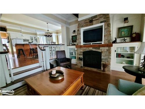 V9 W5-1020 Birch Glen Road, Baysville, ON - Indoor Photo Showing Living Room With Fireplace