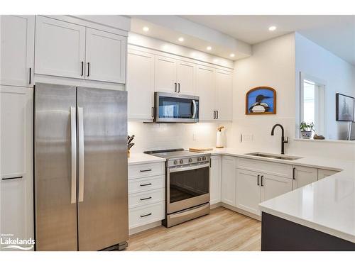 305-18 Campus Trail, Huntsville, ON - Indoor Photo Showing Kitchen With Double Sink With Upgraded Kitchen