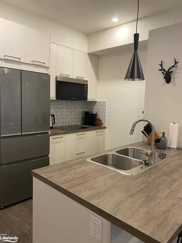 104-10 Beausoleil Lane, The Blue Mountains, ON - Indoor Photo Showing Kitchen With Double Sink