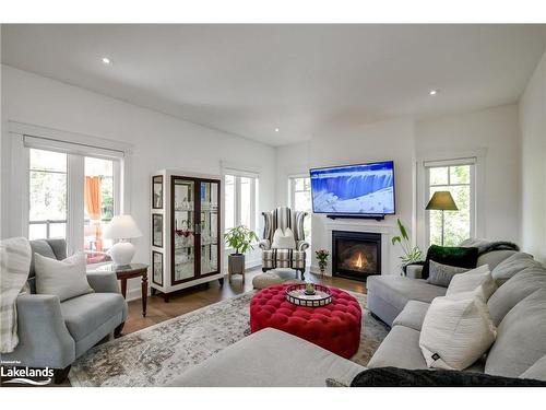 75 Selkirk Drive, Huntsville, ON - Indoor Photo Showing Living Room With Fireplace