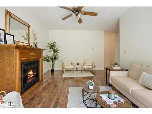 8 Kirbys Way, Huntsville, ON - Indoor Photo Showing Living Room With Fireplace