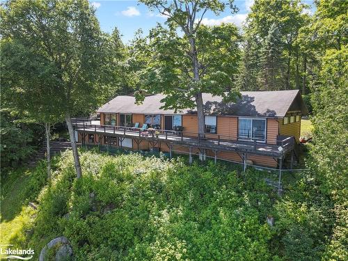 303 Etwell Road, Huntsville, ON - Outdoor With Deck Patio Veranda