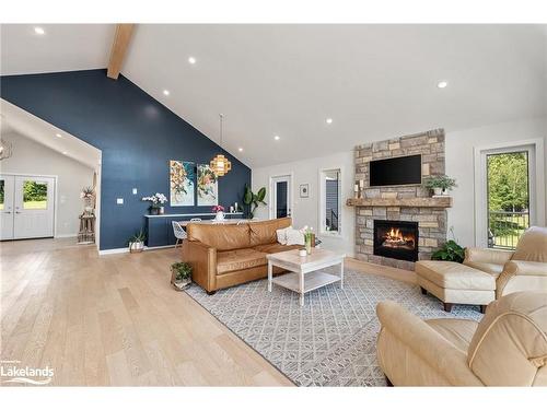 4318 Glamorgan Road, Dysart, ON - Indoor Photo Showing Living Room With Fireplace